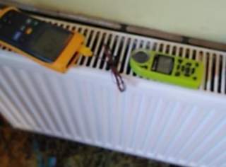 items on top of a radiator, vis camera on flir CAT S60